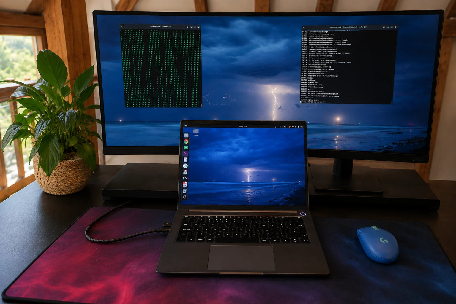 The StarBook Horizon Plus connected to an external monitor for Linux development work